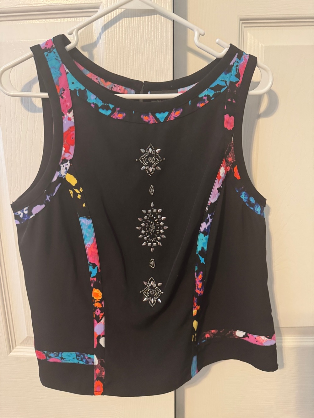Sleeveless Black Top with Multicolor Trim and Embellished Front